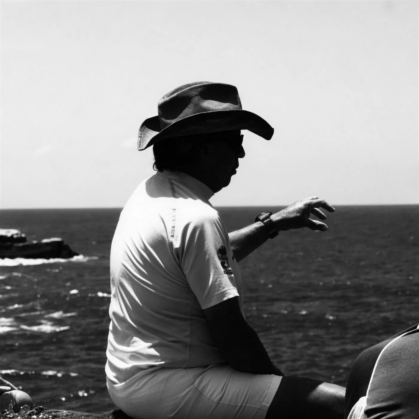Samuel Quiroz explaining the marine landscape to guests, San Cristóbal, Galápagos